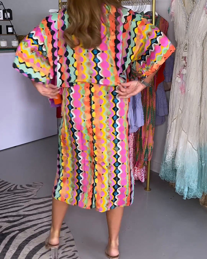 Elena – Multifarvet Damekjole med V-udskæring og Midi-længde