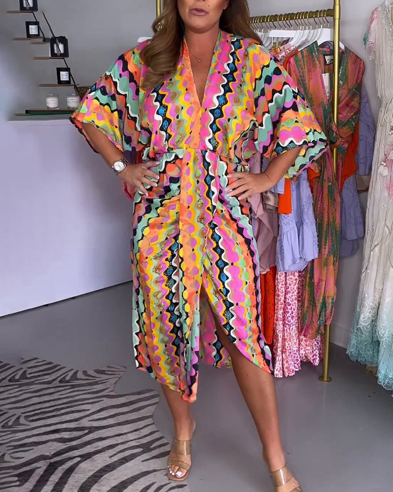 Elena – Multifarvet Damekjole med V-udskæring og Midi-længde