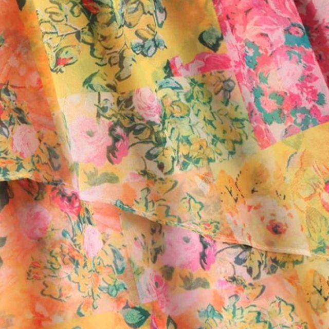 Miora | Solrig solkjole med blomster