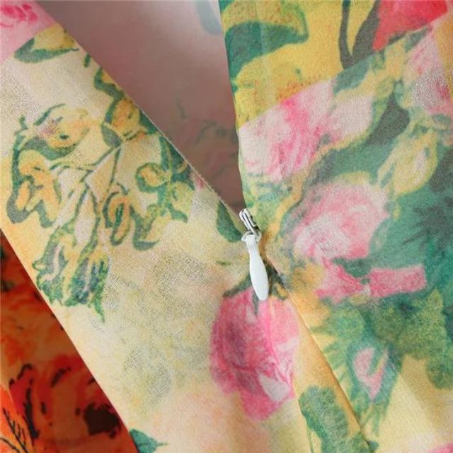 Miora | Solrig solkjole med blomster