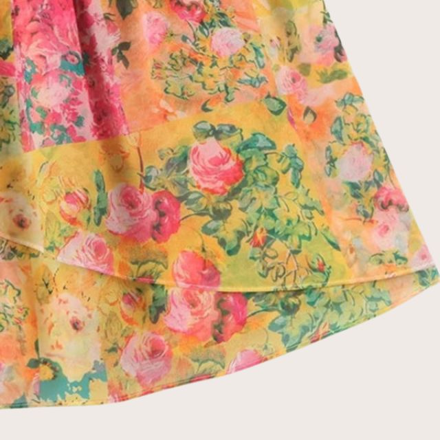Miora | Solrig solkjole med blomster