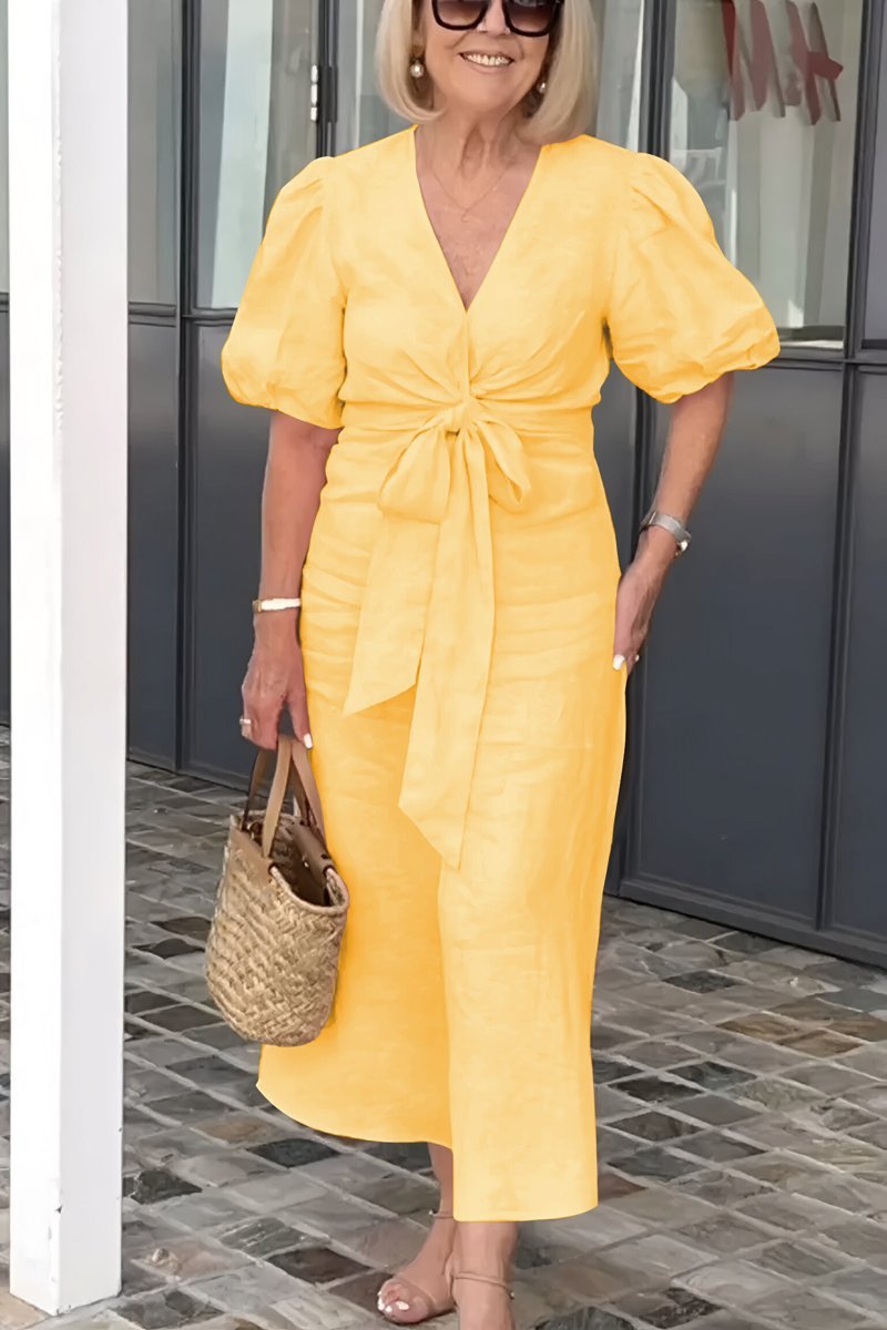 Santis bomuldskjole med v-hals og pufærmer