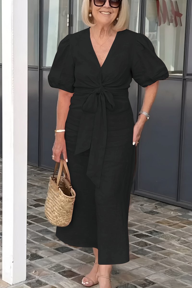 Santis bomuldskjole med v-hals og pufærmer