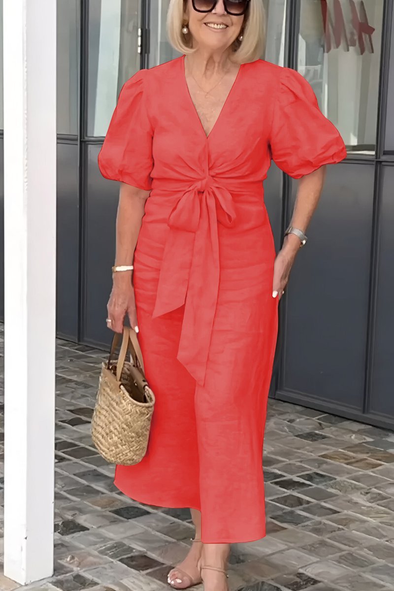 Santis bomuldskjole med v-hals og pufærmer