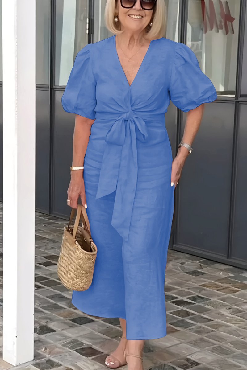 Santis bomuldskjole med v-hals og pufærmer