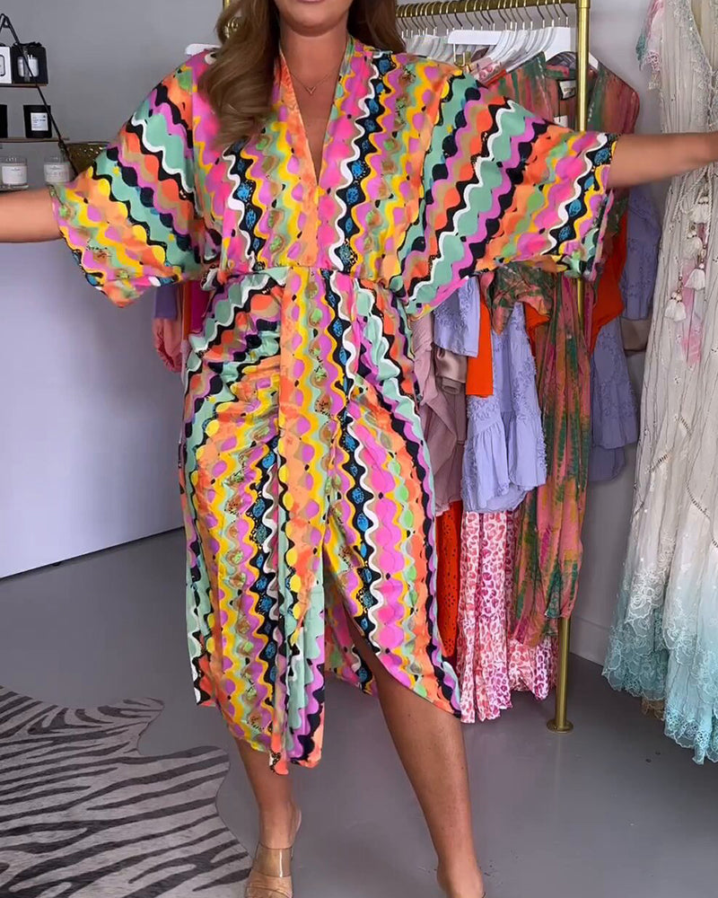 Elena – Multifarvet Damekjole med V-udskæring og Midi-længde