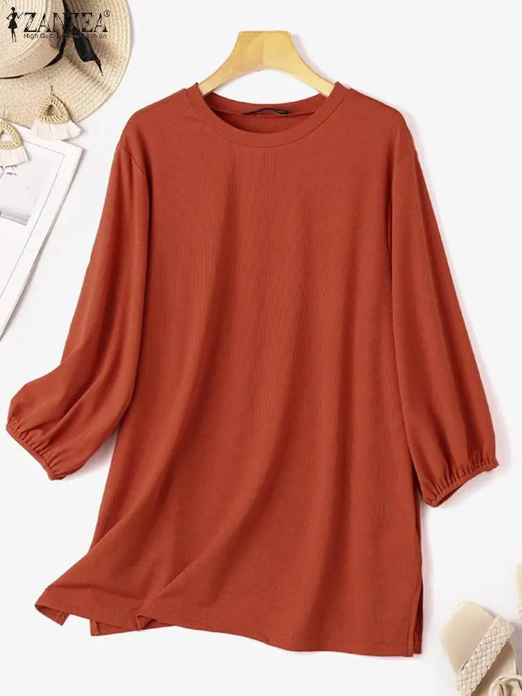Amina – Elegant Damebluse med Pufærmer og Løs Pasform